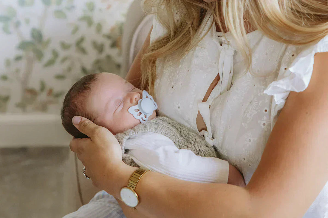 How to get baby to take pacifier